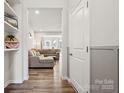 Inviting open-concept living space showcasing hardwood floors and modern finishes at 13323 Savaine St, Charlotte, NC 28278