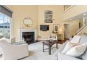 Cozy living room featuring a fireplace, comfortable seating, and modern decor at 13733 Castleford Dr, Mint Hill, NC 28227