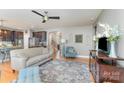 Inviting living room with hardwood floors and a cozy seating area at 133 Glade Valley Ave, Mooresville, NC 28117