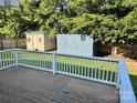 Spacious wooden deck overlooking the backyard with storage sheds at 2289 Kestrel Dr, Rock Hill, SC 29732