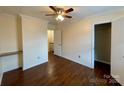 Bright bedroom with hardwood floors, crown molding, and a closet, offering a comfortable living space at 250 Nixon Rd # 41, Belmont, NC 28012