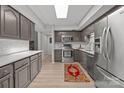 Well-equipped kitchen featuring stainless steel appliances and sleek countertops at 4208 Burning Tree Dr, Charlotte, NC 28277