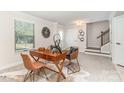 Office featuring modern decor, and a writing desk with a cowhide rug, bright with natural light at 4436 Carteret St, Charlotte, NC 28205