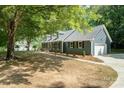 Attractive home with a blend of classic design, complemented by a side-entry garage and landscaped surroundings at 133 Pecan Ln, Salisbury, NC 28146