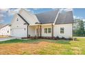 Charming single-Gathering home featuring a two-car garage and classic architectural style at 150 Autumn Blaze Rd, China Grove, NC 28023