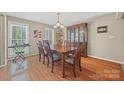 Elegant dining room with hardwood floors, natural light and traditional furnishings at 1921 Williford Woods Ln, Rock Hill, SC 29730