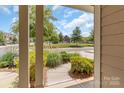This inviting front porch offers a tranquil outdoor space to enjoy the well-maintained landscaping and neighborhood views at 3159 Hartson Pointe Dr, Fort Mill, SC 29707