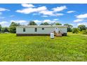 View of the back of the home with a propane tank at 1133 Lynn Ln, Catawba, NC 28609