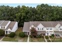 Overhead view of townhouses showing well-maintained lawns and landscaping at 12914 Sickles Dr, Charlotte, NC 28273