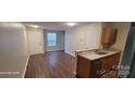 Inviting living space featuring wood-look floors and natural light at 165 Brantley Place Dr, Mooresville, NC 28117