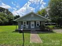 Lovely single-story home featuring a well-manicured lawn and inviting entrance at 227 Nassau Pl, Mount Holly, NC 28120