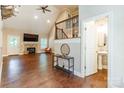 Bright living room features soaring ceilings, a fireplace, and wood floors, creating a welcoming atmosphere at 4203 Flint Dr, Lancaster, SC 29720