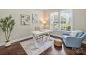 Comfortable office with a large window, desk, chair, and stylish decor for a productive work environment at 901 Deercross Ln, Waxhaw, NC 28173