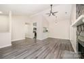 Spacious living room featuring gray floors and views into the kitchen at 9122 Nathaniel Russell Ln, Charlotte, NC 28227