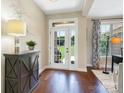 Entryway showcasing hardwood floors, a bright glass door, and stylish decor at 1011 Duntov Dr, Monroe, NC 28110