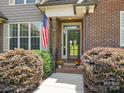 Close-up of front entrance, showing brickwork and a tidy, welcoming exterior at 1011 Duntov Dr, Monroe, NC 28110