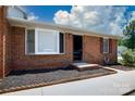 Inviting brick home with manicured landscaping and a clear view of the house number, 1140 at 1140 Mckinnon Dr, Rock Hill, SC 29732