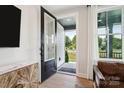 Inviting entryway showcasing an open front door with sidelights and a view of the home's exterior at 327 Ardmore Dr, Belmont, NC 28012
