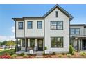 Charming two-story home with a welcoming front porch and well-maintained landscaping at 327 Ardmore Dr, Belmont, NC 28012