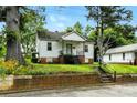 Charming single Gathering home with a cozy front porch and inviting curb appeal at 450 1St Se St, Hickory, NC 28602