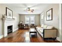 Bright living room with hardwood floors, fireplace, and ample natural light at 450 1St Se St, Hickory, NC 28602