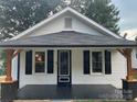 Charming front porch features black painted floor, black shutters, and updated support columns at 508 E Rice St, Landis, NC 28088