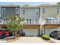 Townhome with a garage, back deck and patio area perfect for outdoor relaxation and entertaining at 570 Sixth Baxter Xing # 16, Fort Mill, SC 29708