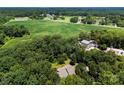 Expansive aerial view of a home surrounded by lush greenery and farmland at 1505 N Cansler St, Kings Mountain, NC 28086
