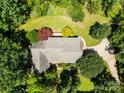 Overhead view showcasing the roof, landscaping, and driveway of a serene home at 1505 N Cansler St, Kings Mountain, NC 28086