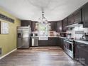 Spacious kitchen features stainless steel appliances, a large sink, and ample counter space at 4615 Lockhart Rd, Sharon, SC 29742