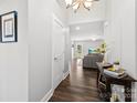 Bright entryway with a view into the living room at 6401 Morehead Rd, Harrisburg, NC 28075
