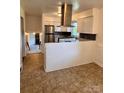 Bright kitchen with stainless steel appliances and tile backsplash at 2216 Helen Dr, Gastonia, NC 28054