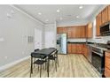 Bright kitchen with stainless steel appliances and dining area at 474 New Bern Station Ct, Charlotte, NC 28209