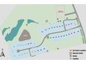 Detailed community map showing lot locations, walking trails, stormwater management, and nearby school at 3026 Tramore Dr, Harrisburg, NC 28075