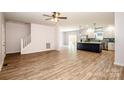 Spacious living room featuring hardwood floors and an open floor plan at 7039 Executive Cir, Denver, NC 28037
