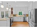 Stylish kitchen with granite counters, stainless appliances, and convenient breakfast bar at 2358 Sparrow Dr, Rock Hill, SC 29732