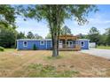Charming blue home with a covered porch at 4351 Saluda Rd, Rock Hill, SC 29730