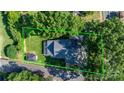 Aerial view of property highlighting its layout, landscaping, and surrounding neighborhood at 704 N Main Ave, Newton, NC 28658