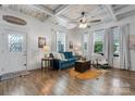 Cozy living room featuring stylish decor, ample natural light, and a decorative ceiling at 704 N Main Ave, Newton, NC 28658