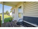 Cozy front porch with a bench, providing a welcoming entrance to the home at 2694 Rock Dam Rd, Lincolnton, NC 28092