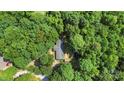 Overhead view of wooded property with driveway and grassy areas at 5212 Timber Creek Ct, Kings Mountain, NC 28086