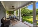 Inviting back porch featuring comfortable seating perfect for relaxing and enjoying the outdoors at 15628 Waterfront Dr, Huntersville, NC 28078