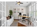 Cozy home office features modern desk, stylish rug, and calming decor, creating the perfect work-from-home space at 2010 Brightflower Ln, York, SC 29745
