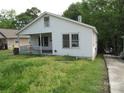 Quaint one-story home featuring a welcoming front porch and traditional design at 1146 Buffalo St, Shelby, NC 28150