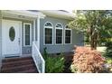 Inviting entrance with sidelight windows, brick steps and tidy landscaping at 2949 Glenstone Dr, Rock Hill, SC 29730