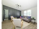 Inviting living room with stylish furniture, natural light, and a modern ceiling fixture at 4833 Verde View Dr, Gastonia, NC 28056