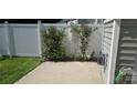 Concrete patio featuring partial fencing and space for outdoor seating or dining at 162 Autumn Falls Dr, Lake Wylie, SC 29710
