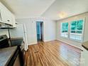 Bright kitchen with hardwood floors, stainless steel appliances, and ample counter space at 4832 Gideon Dr, Lincolnton, NC 28092