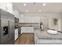 Spacious kitchen featuring stainless steel appliances, a large island, and modern cabinetry at 4044 Beacon Ave # 152, Monroe, NC 28110