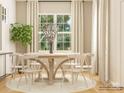 Bright dining area with neutral walls, wood flooring, with a view of backyard and light table at 6448 Fairfax Ct, Maiden, NC 28650